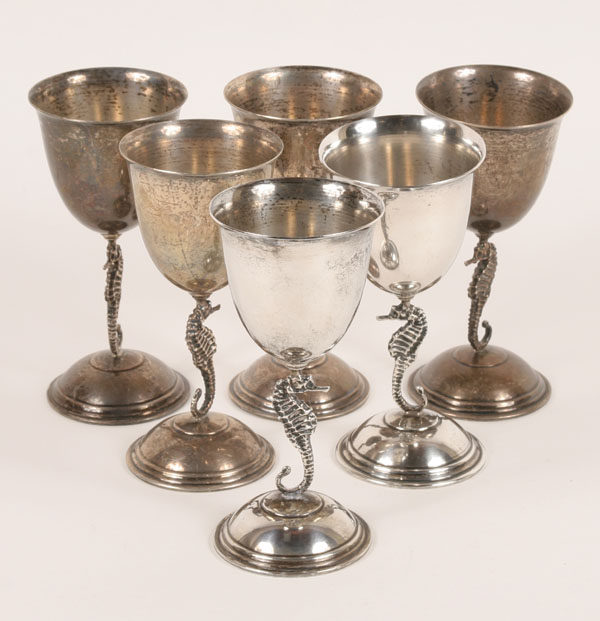 Six sterling goblets with seahorse-form
