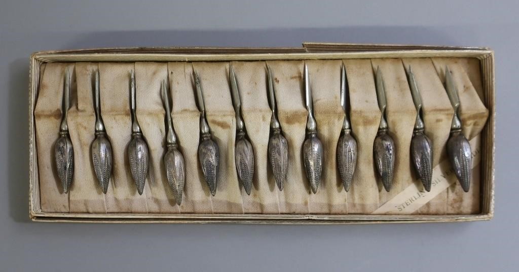 Set of twelve sterling silver handled