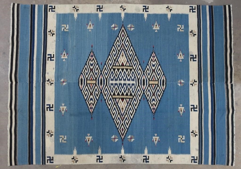 Navajo blanket with blue field,