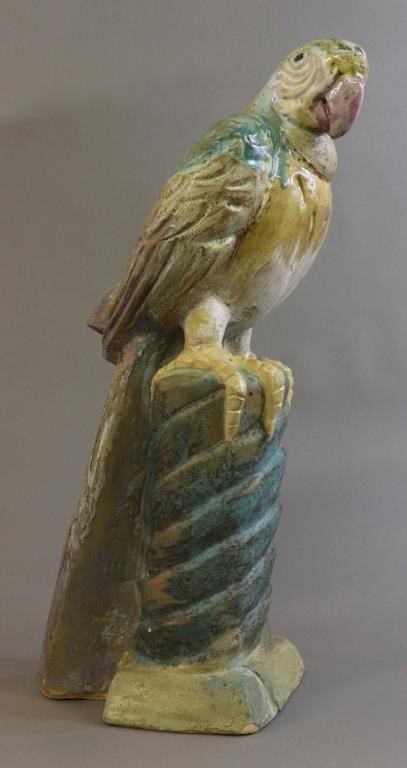 Large terracotta glazed parrot,