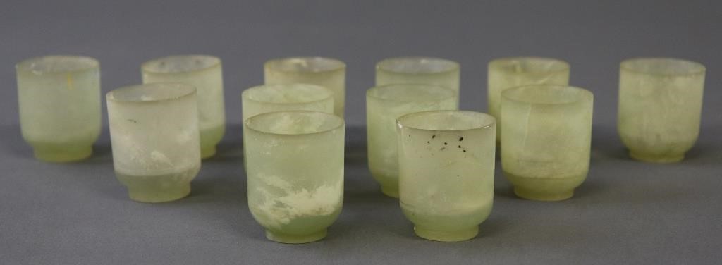 Set of twelve Asian jade small cups,