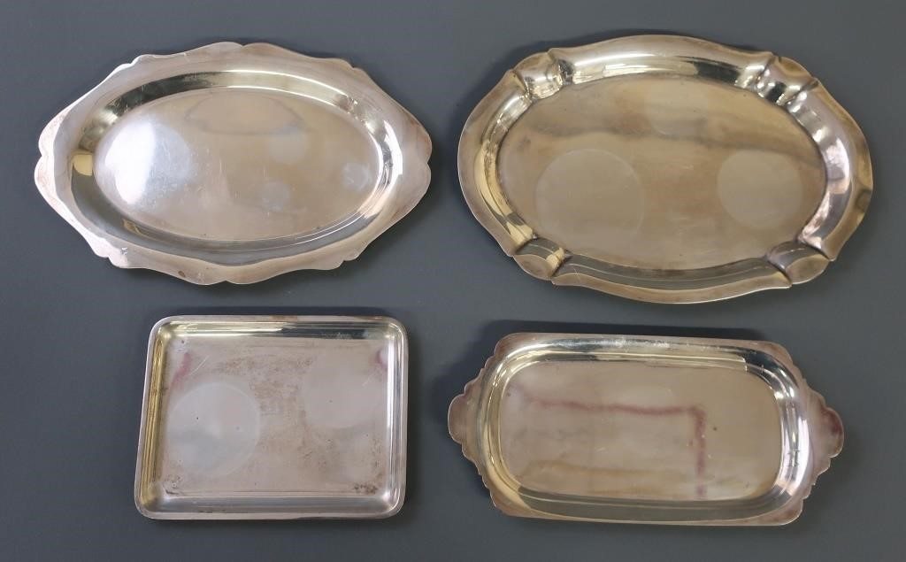 Four small sterling silver trays  311837