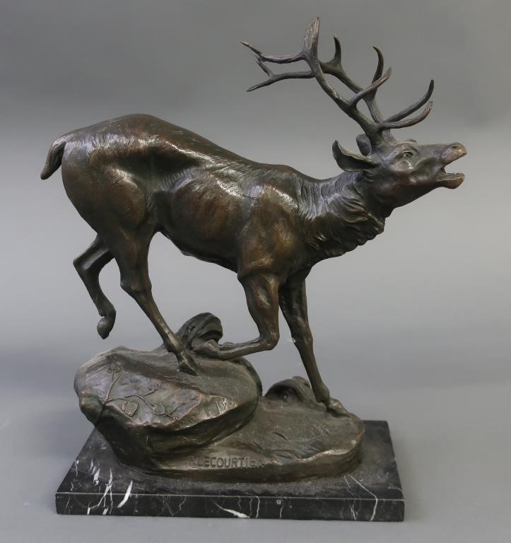 Bronze sculpture of a lowing elk,