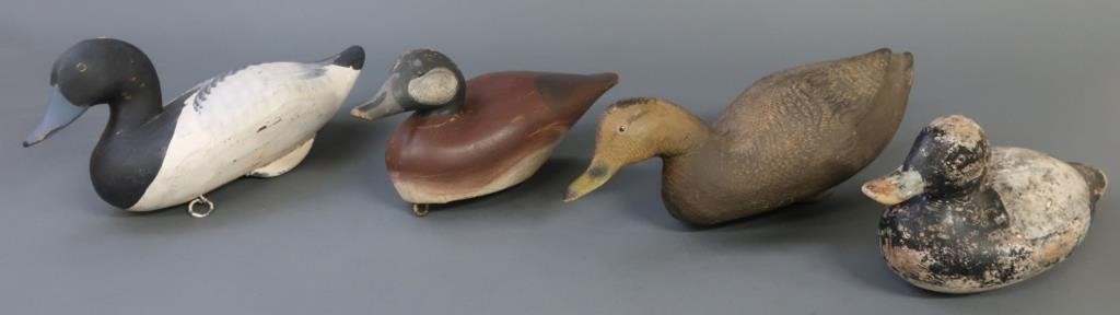 Four duck decoys, to include: a