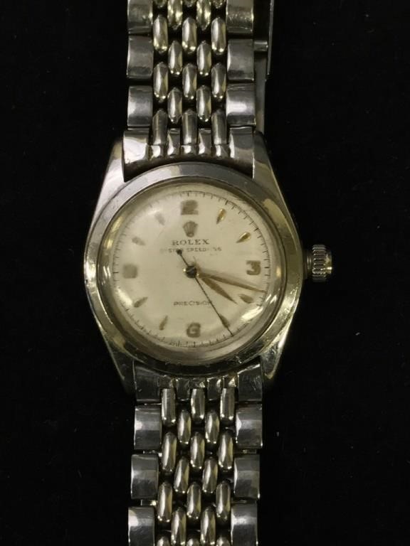 Rolex wrist watch with oyster speeding 31196f