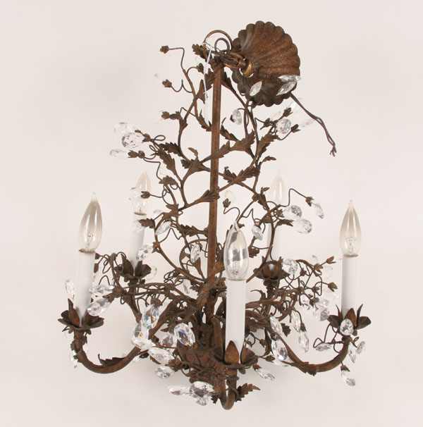 Patinated metal chandelier; vine