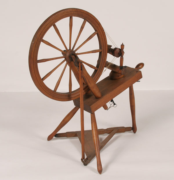 Primitive double drive spinning wheel;