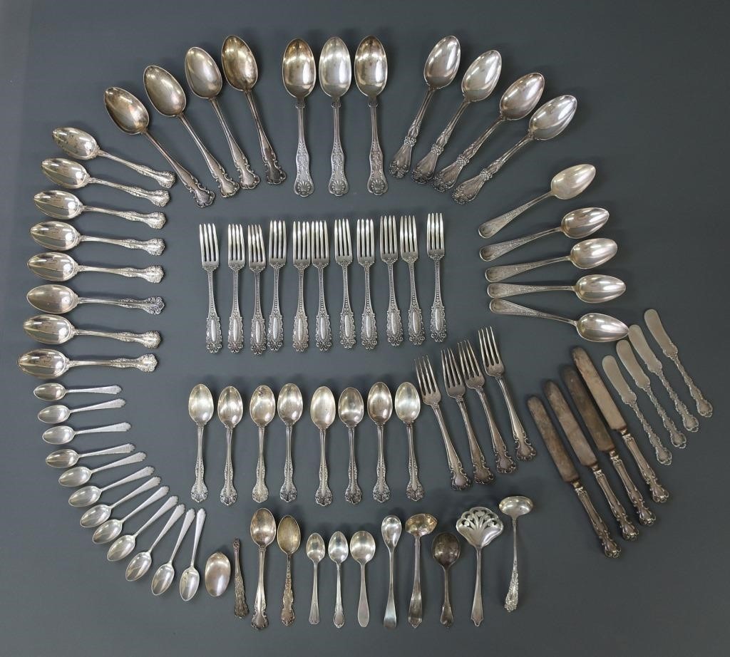 Sterling flatware in various patterns