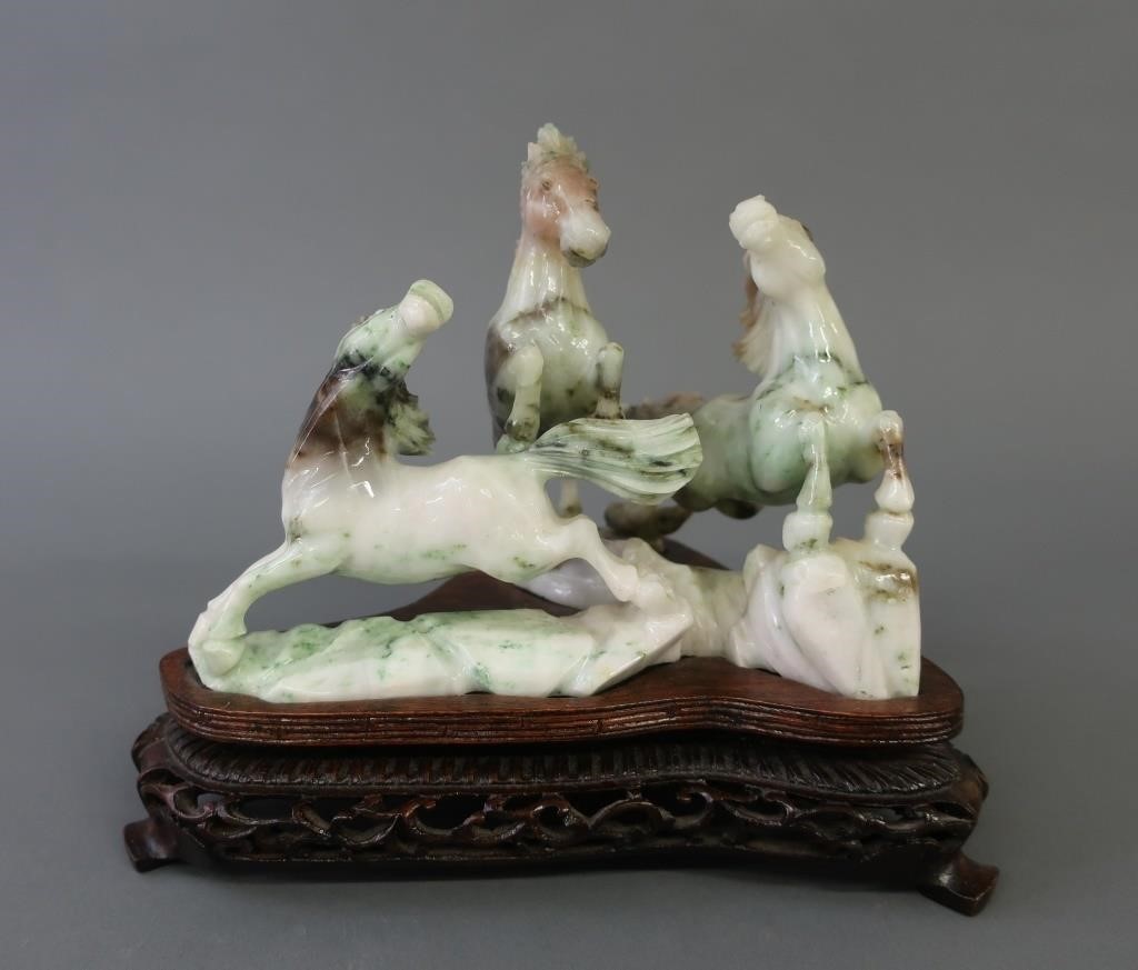 Chinese jade carving of a group of three