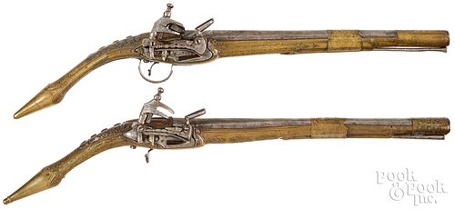 PAIR OF ORNATE ALBANIAN RATTAIL