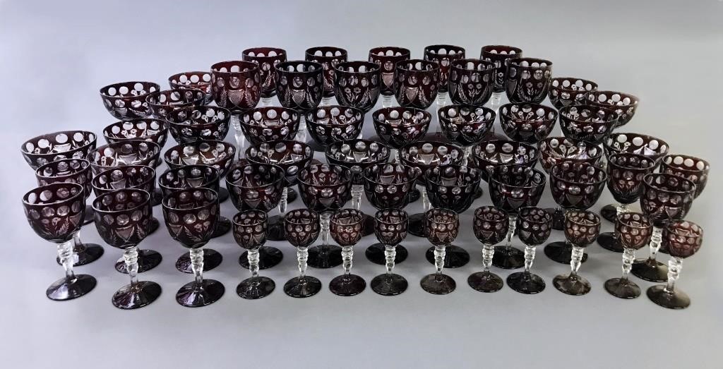 Fifty-eight pieces of red bohemian glassware