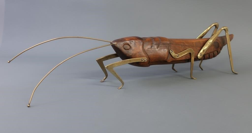 Folk art carved grasshopper with 311b97