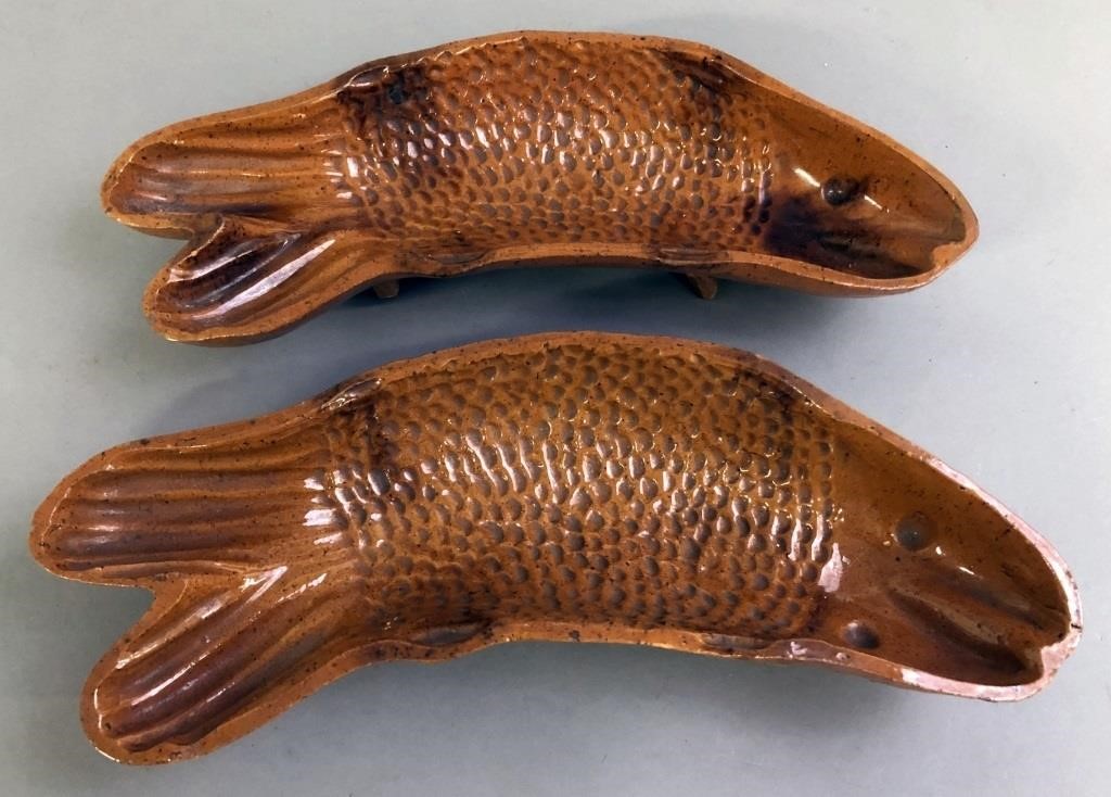 Unusual pair of redware fish molds  311bfa