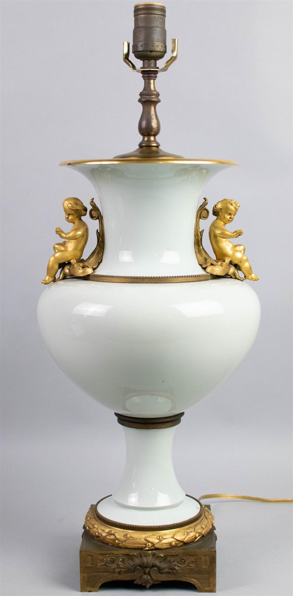 PARCEL-GILT AND PORCELAIN VASE, NOW