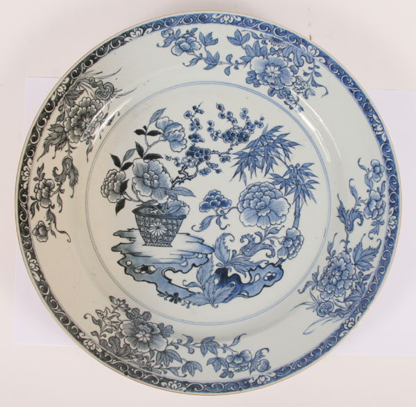 Blue and white porcelain charger; Eastern