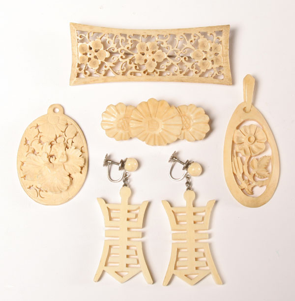 Lot of carved elephant ivory jewelry: