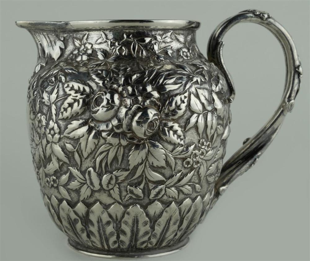 S. KIRK & SON COIN SILVER REPOUSSE PITCHERS.