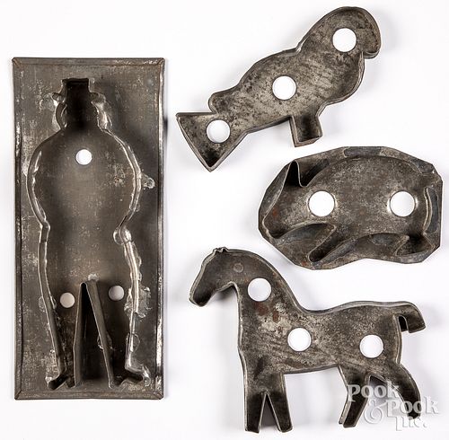 FOUR TIN COOKIE CUTTERS, 19TH C.Four