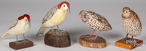 FOUR CARVED AND PAINTED BIRDSFour