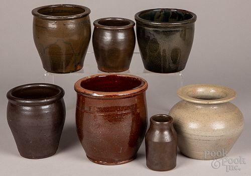 SEVEN STONEWARE AND REDWARE CROCKSSeven