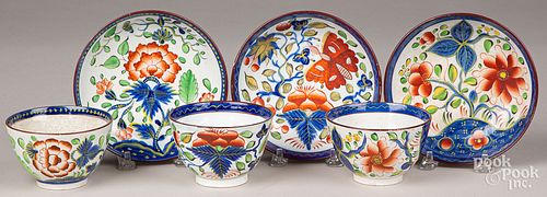 THREE GAUDY DUTCH CUPS AND SAUCERSThree 30ff04