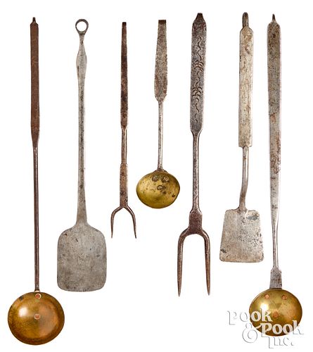 SEVEN WROUGHT IRON AND BRASS UTENSILS  310064