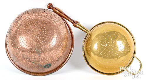 TWO LARGE BRASS AND COPPER COLANDERS  31013f