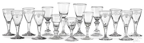 FIFTEEN COLORLESS GLASS CORDIALS