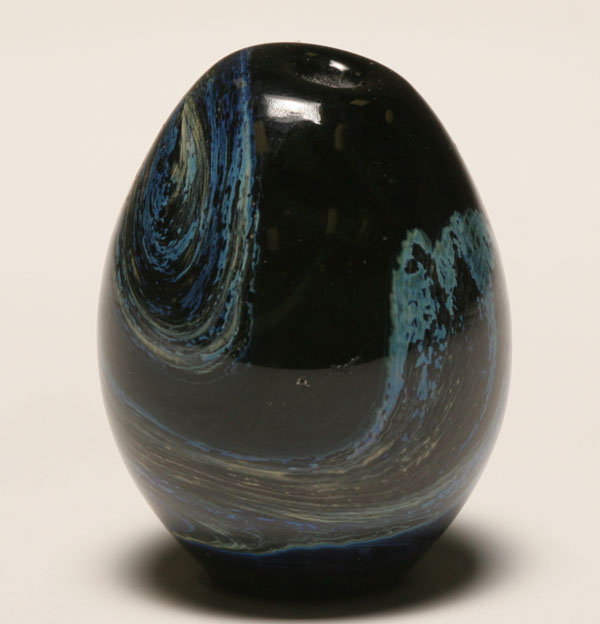 Blue studio glass egg paperweight.