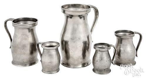 FIVE GRADUATED PEWTER MEASURES,