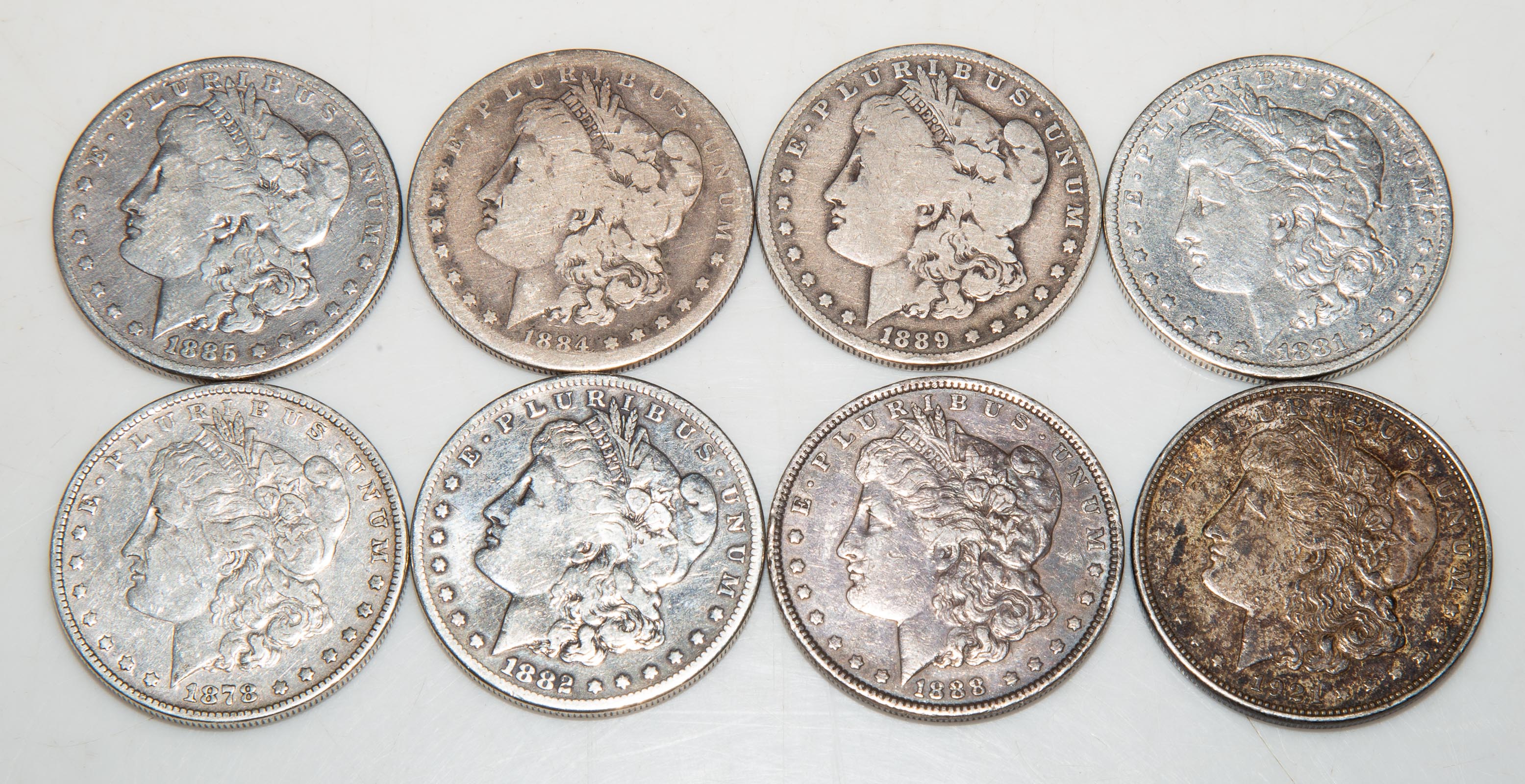 EIGHT DIFFERENT MORGAN SILVER DOLLARS 31053d