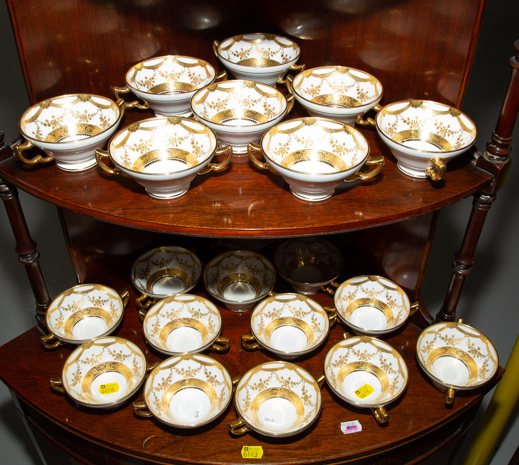 21 MINTON GILT DECORATED TEA CUPS