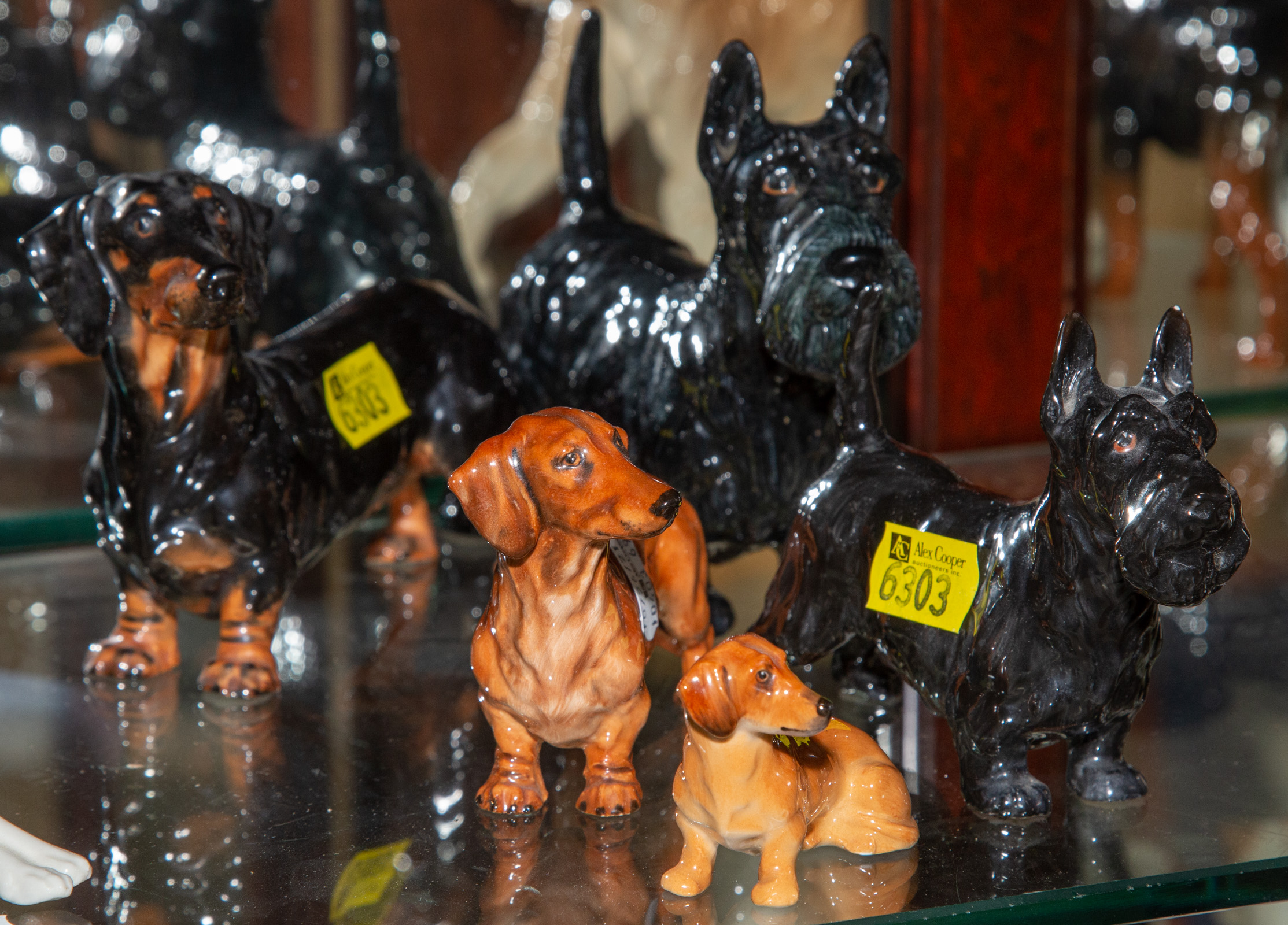 FIVE ROYAL DOULTON DOG FIGURES Includes