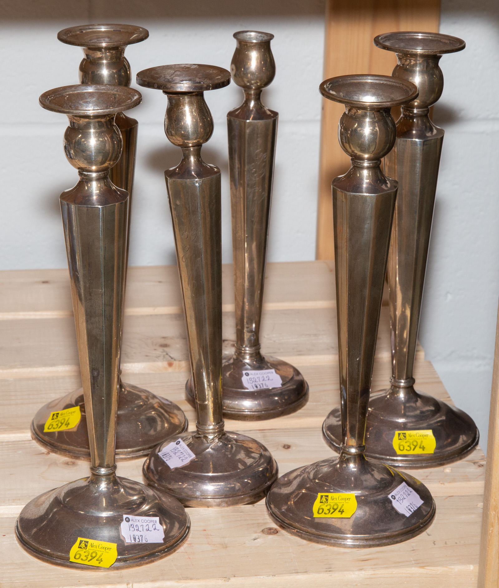 THREE PAIRS OF STERLING WEIGHTED CANDLESTICKS