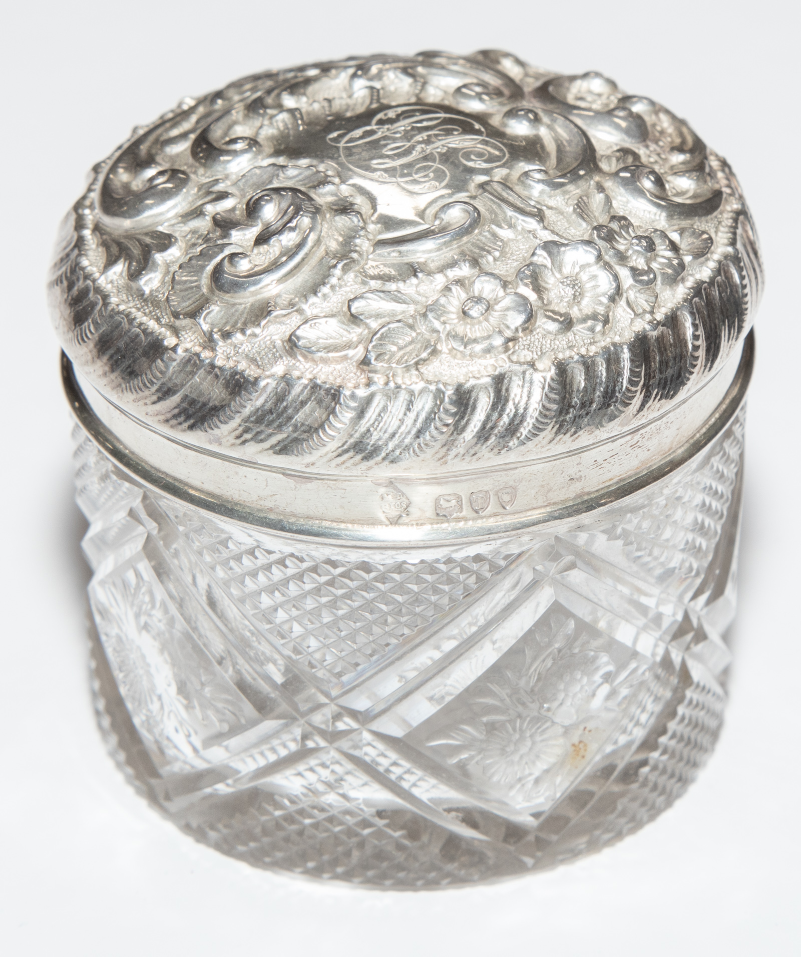 A STERLING LIDDED DRESSER JAR Monogrammed.