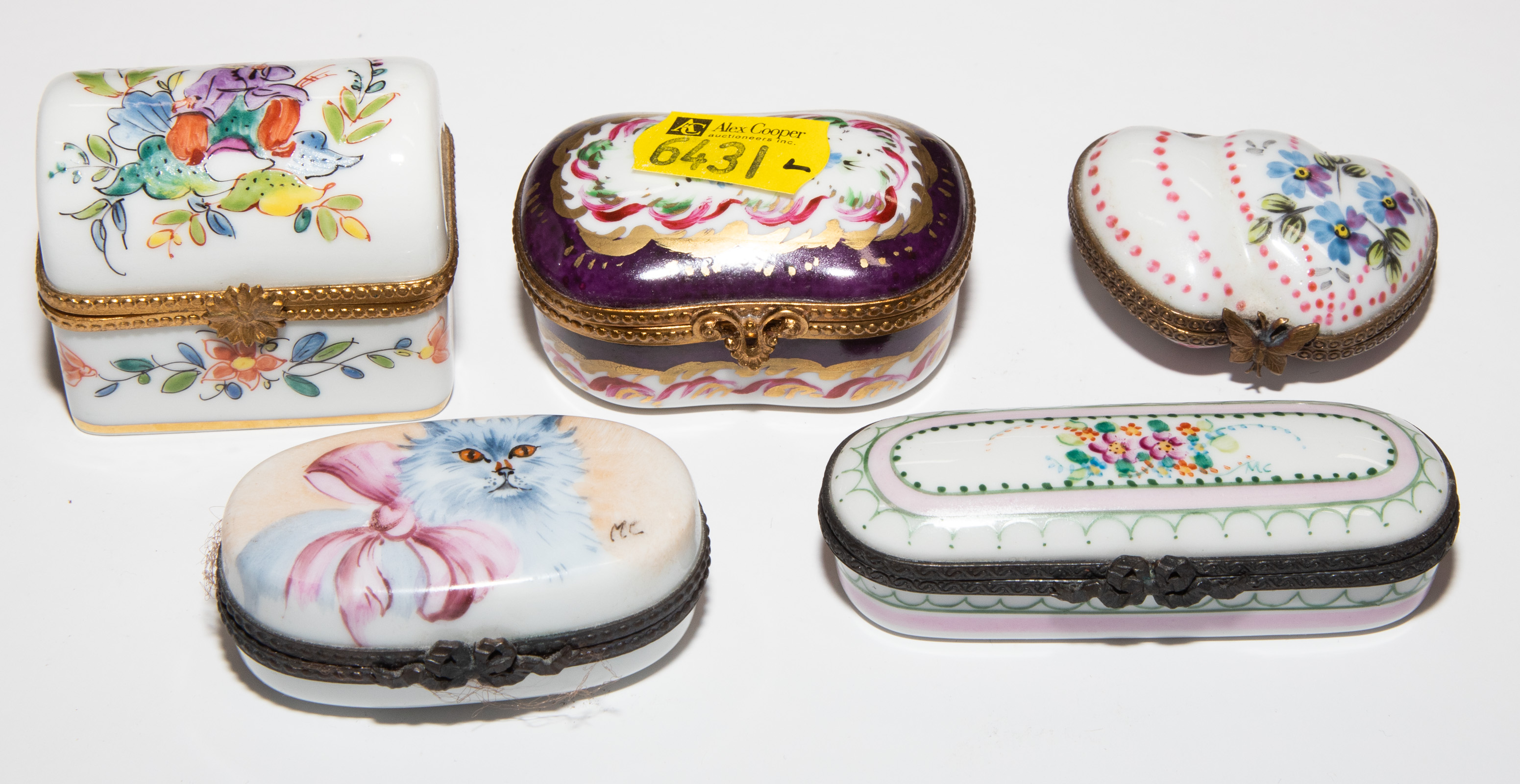 FIVE LIMOGES LIDDED DRESSER BOXES .