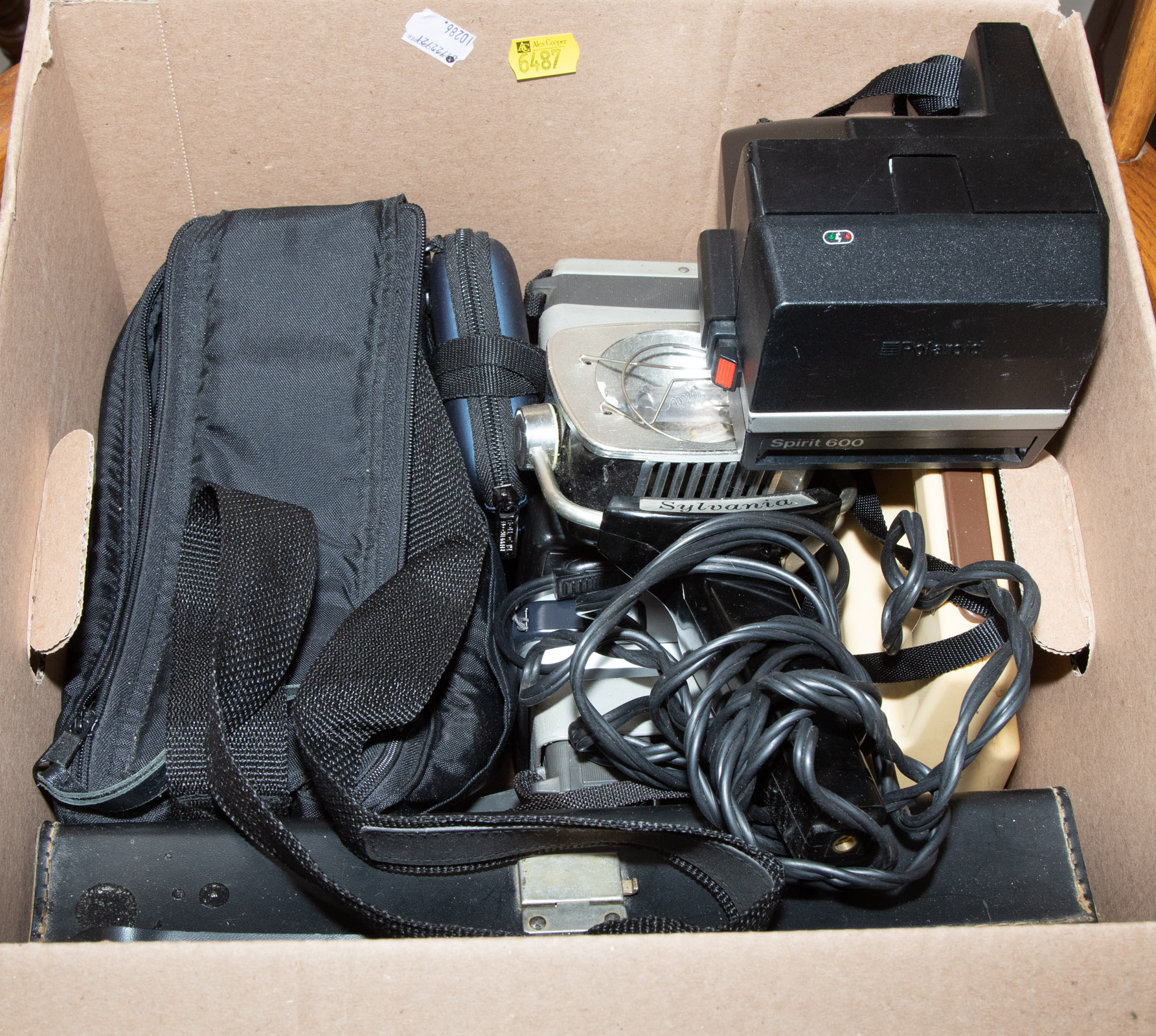 A BOX OF CAMERA ITEMS Includes 3 Polaroid