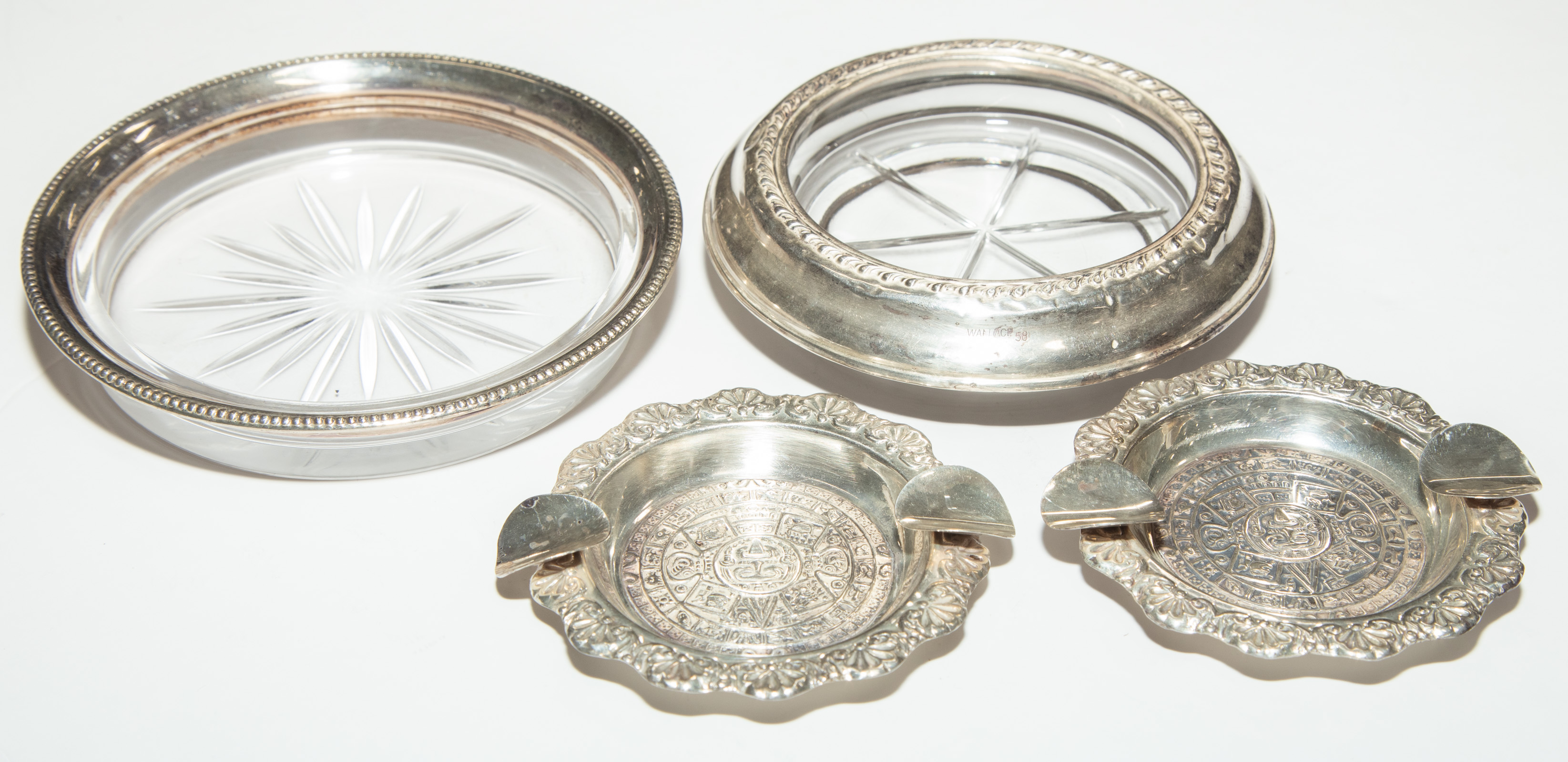 TWO MEXICAN STERLING ASH TRAYS & TWO