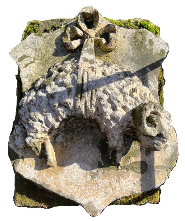 A COMPOSITE STONE WALL PLAQUE with