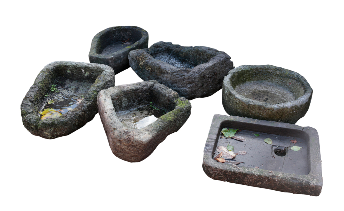 A GROUP OF SIX SHAPED STONE TROUGHS 3108dc