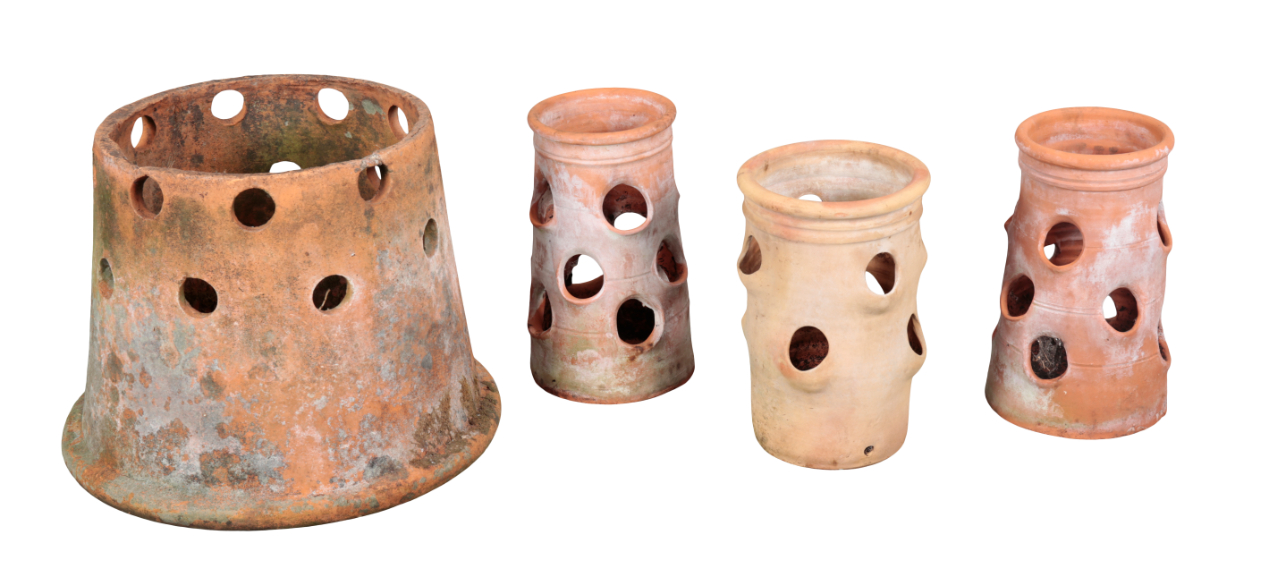 A GROUP OF FOUR TERRACOTTA PLANTERS