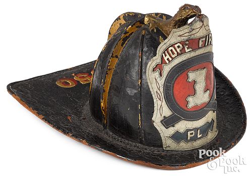 PAINTED LEATHER FIRE HELMET DATED 313414