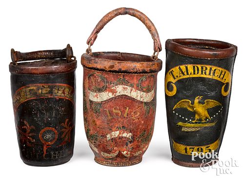 THREE PAINTED LEATHER FIRE BUCKETS  313419