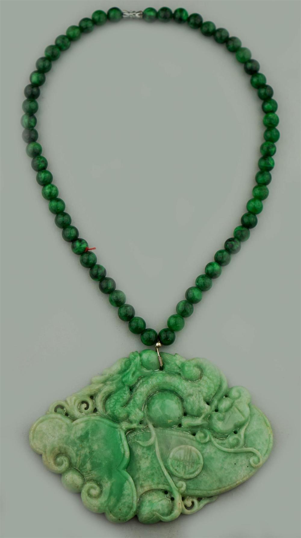 LARGE CARVED JADE AND GREEN BEAD