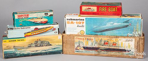 GROUP OF TOY BOAT BOXES.Group of