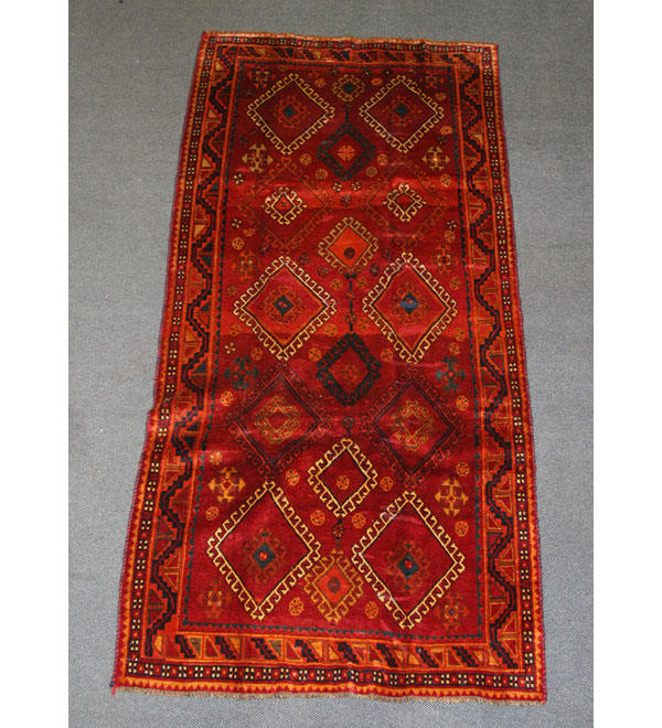 Semi-antique Shiraz area rug; 9.8x4.6.