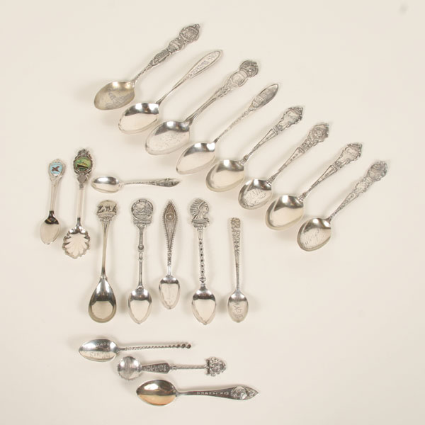 Nineteen souvenir spoons from west