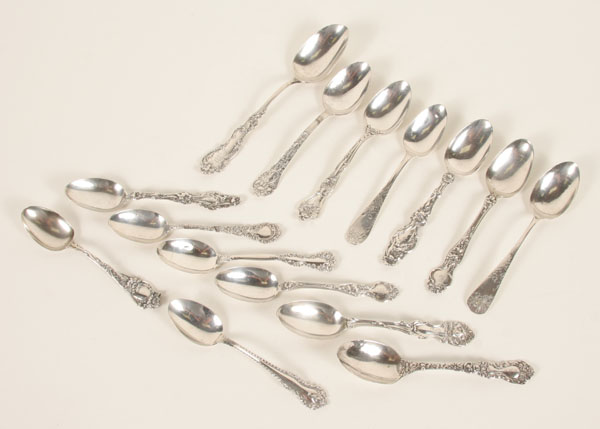 Fifteen sterling spoons with decorative 4ec50