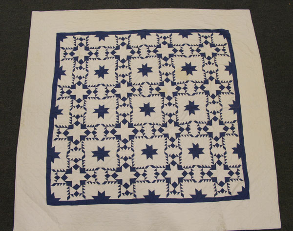 Hand sewn quilt; blue and white