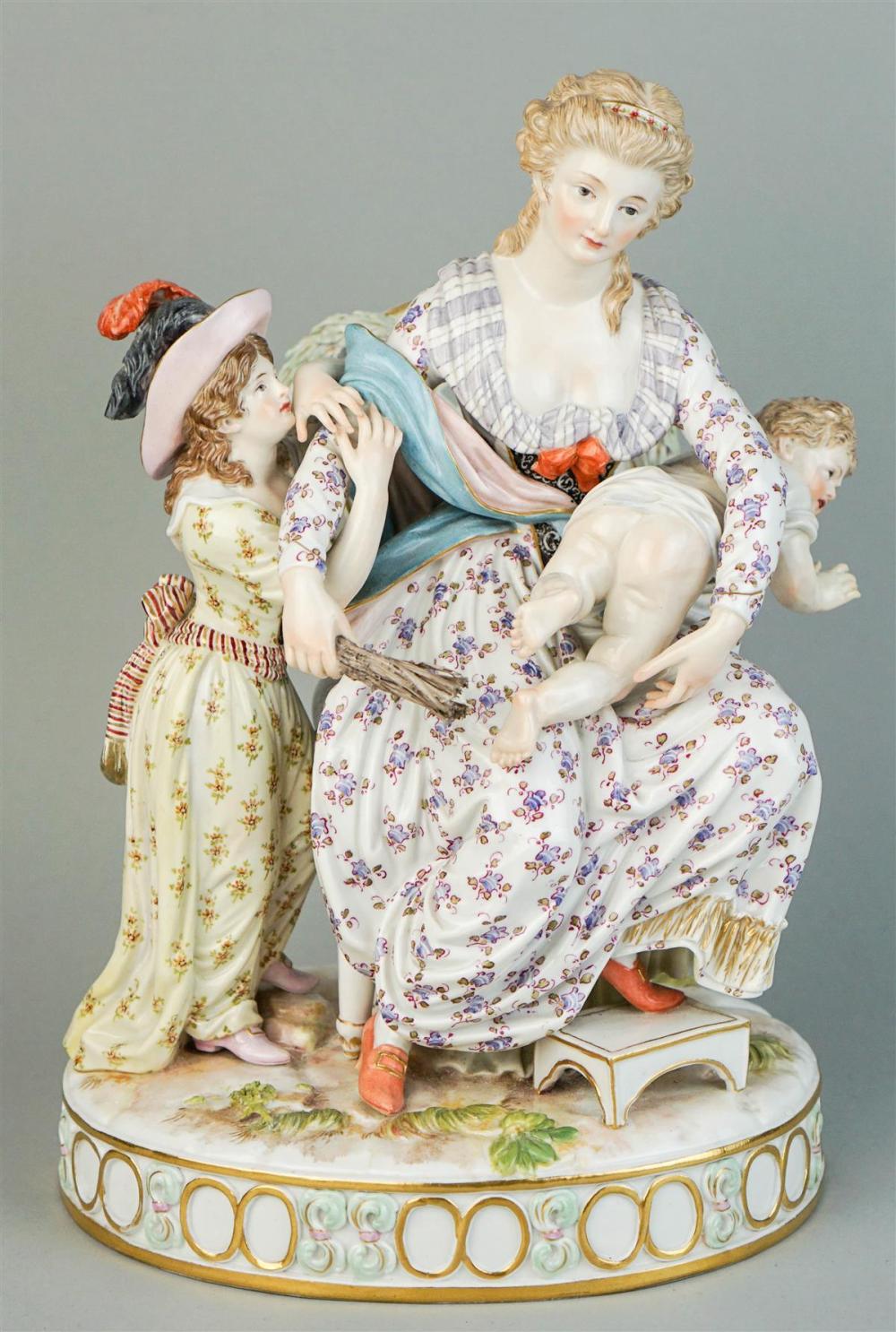 MEISSEN FIGURAL GROUP OF A CHILD